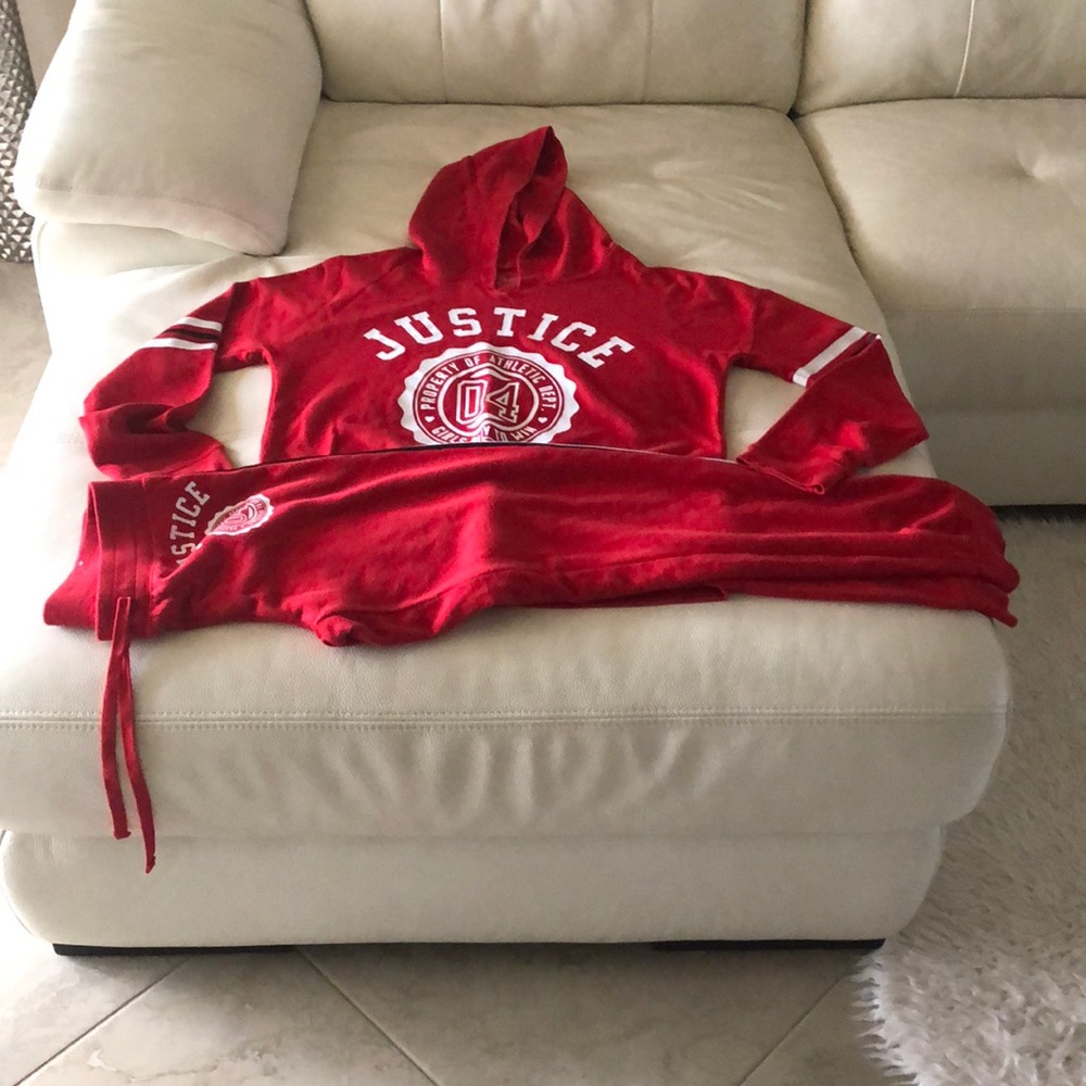 Used red justice sweatsuit, and black pants